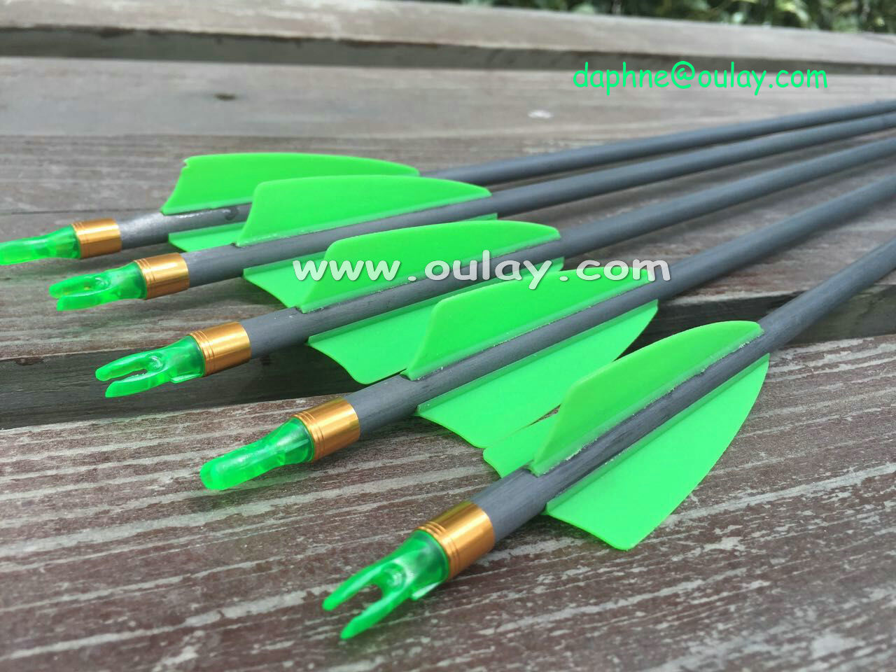 Archery carbon arrows with green vanes